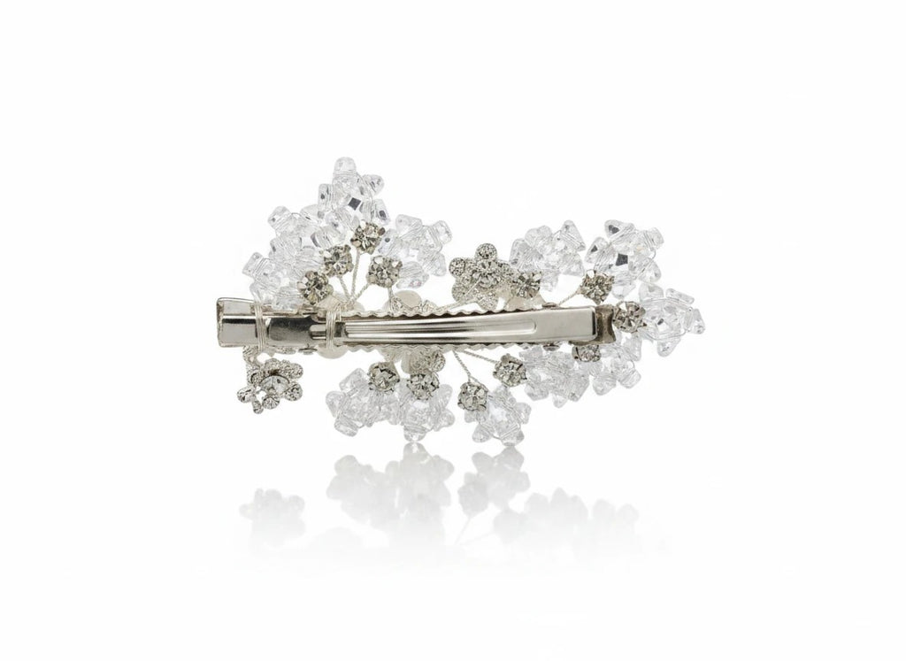KEVOUR crystal floral bridal hair clip with clear rhinestones and frosted blooms on a silver-tone alligator clip.