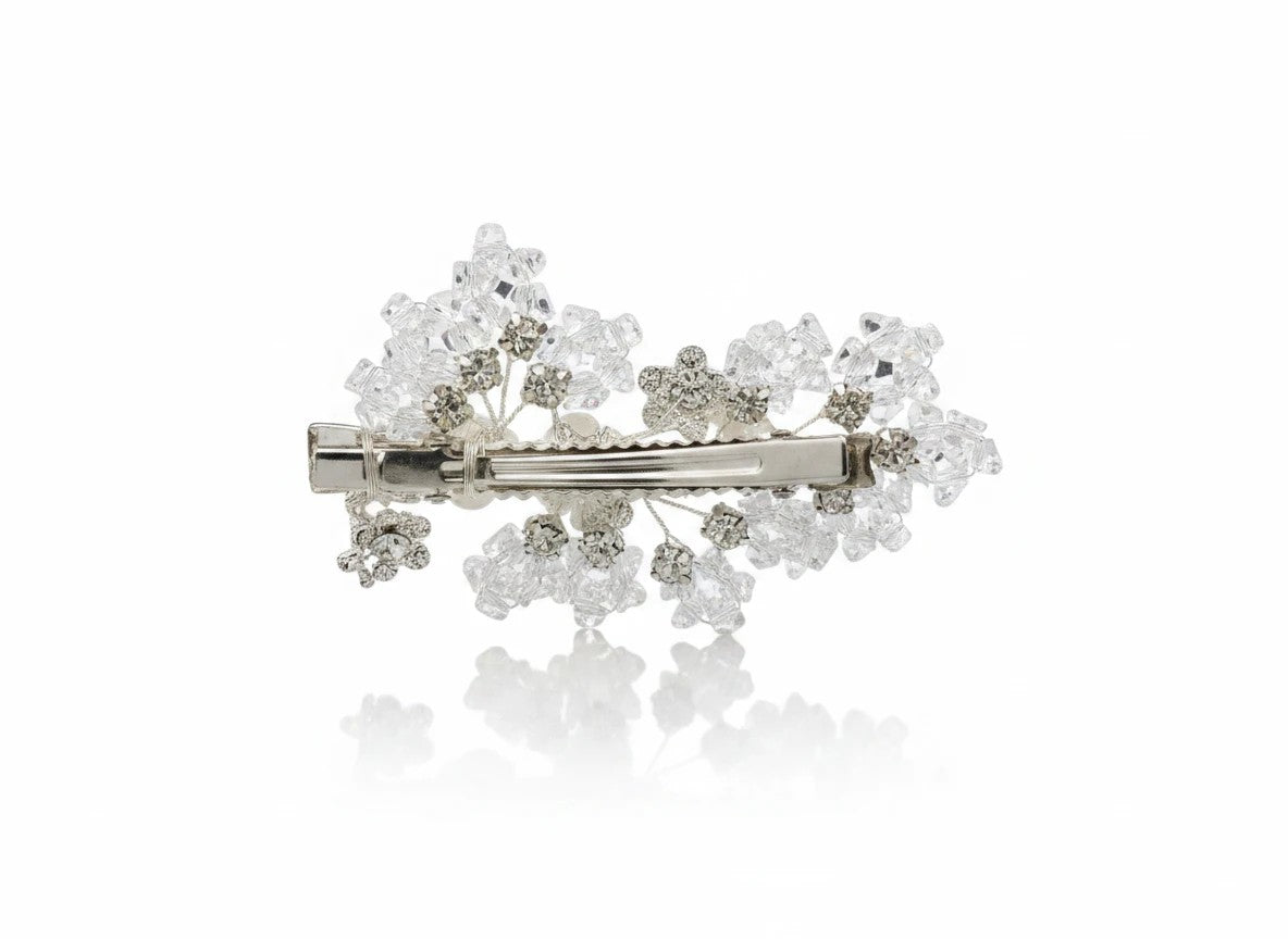 KEVOUR crystal floral bridal hair clip with clear rhinestones and frosted blooms on a silver-tone alligator clip.
