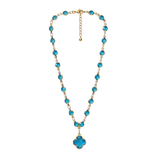 KEVOUR 18K gold-filled station necklace featuring vivid blue cubic zirconia stones and a matching clover pendant.