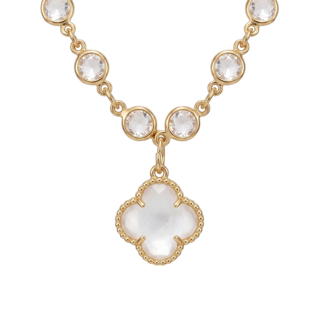 KEVOUR 18K gold-filled station necklace featuring bezel-set clear cubic zirconia crystals and a clover charm pendant.