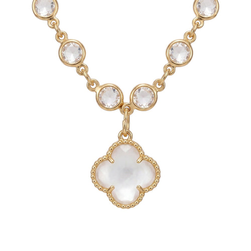 KEVOUR 18K gold-filled station necklace featuring bezel-set clear cubic zirconia crystals and a clover charm pendant.