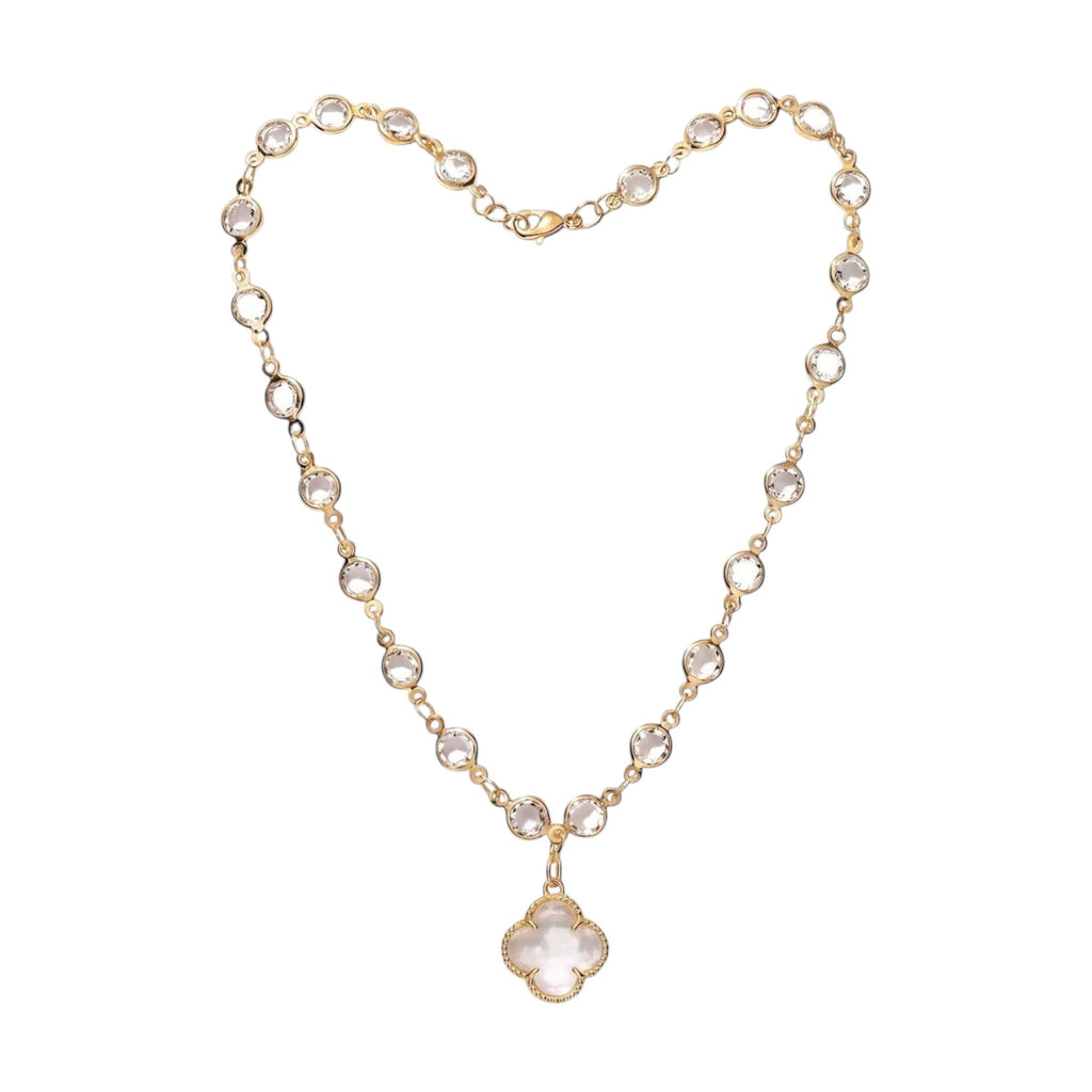 KEVOUR 18K gold-filled station necklace featuring bezel-set clear cubic zirconia crystals and a clover charm pendant.