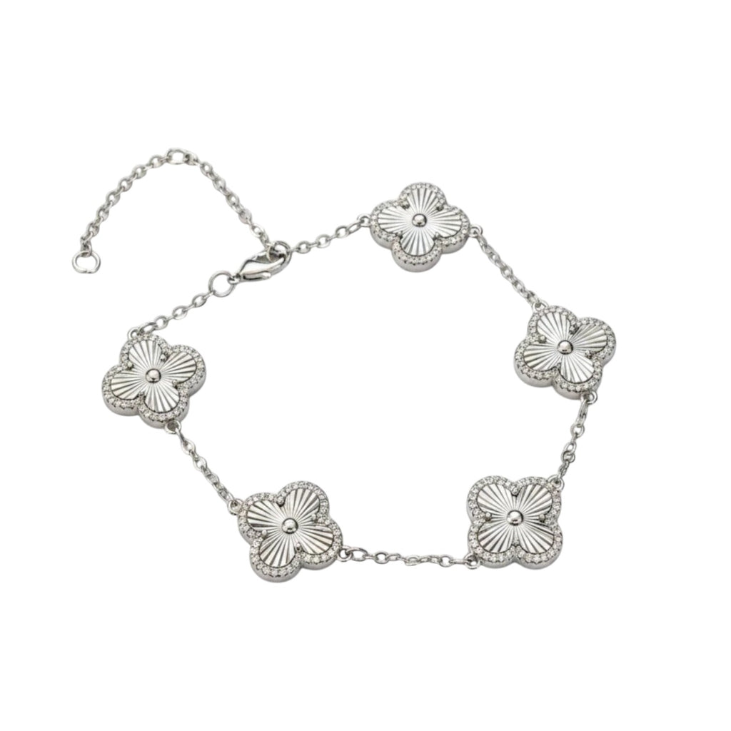 KEVOUR 18K white gold-filled bracelet featuring five fluted clover charms with pavé cubic zirconia accents.
