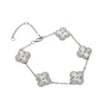 KEVOUR 18K white gold-filled bracelet featuring five fluted clover charms with pavé cubic zirconia accents.