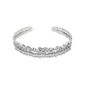 KEVOUR 18K white gold-filled open cuff bracelet featuring baguette and round-cut cubic zirconia stones.
